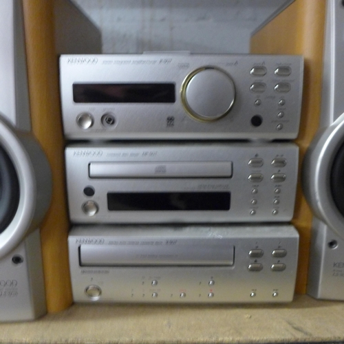 2151 - A Kenwood stereo; an amplifier/tuner (RSG7), a CD player (DP-SG7), an auto reverse cassette player (... 