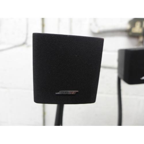 2166 - Two Bose standing speakers