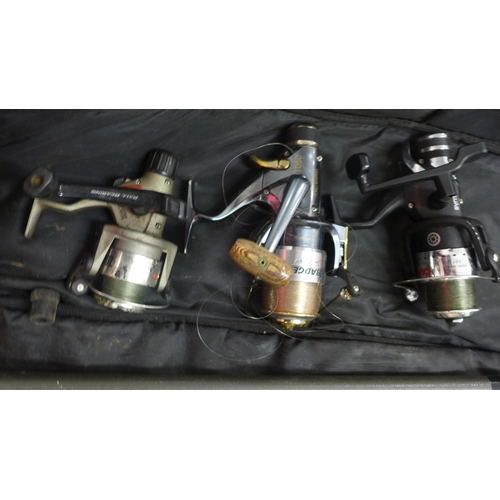 2172 - Fishing rods/pole and three reels in a bag
