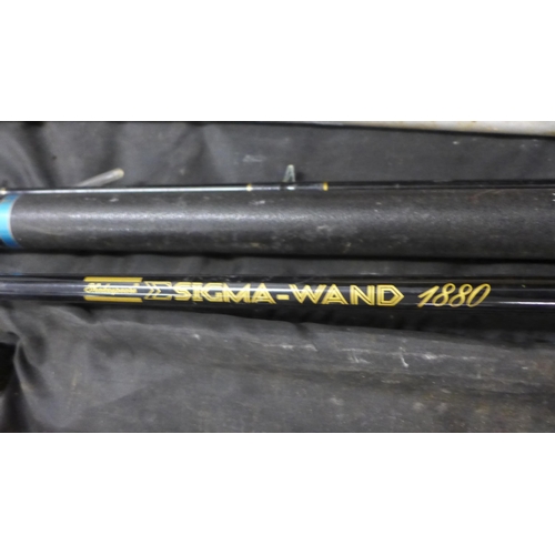 2172 - Fishing rods/pole and three reels in a bag