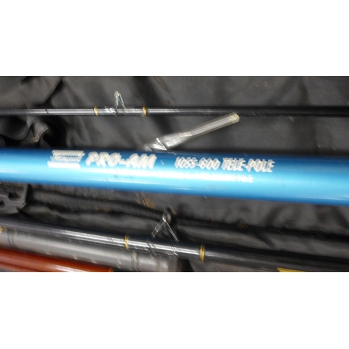2172 - Fishing rods/pole and three reels in a bag