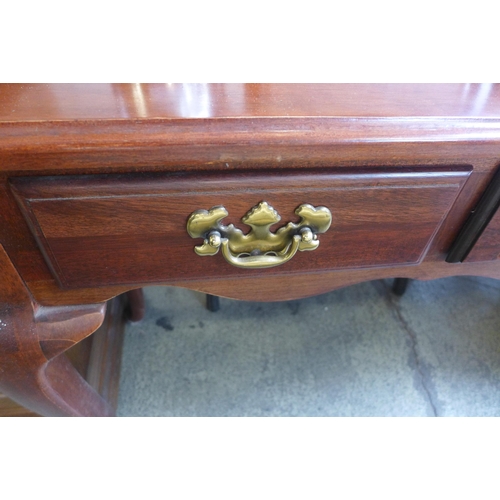 1591 - A Cherry three drawer console table