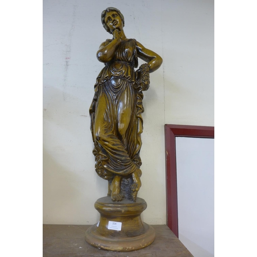 325 - A French Art Nouveau style faux wood figure of a lady