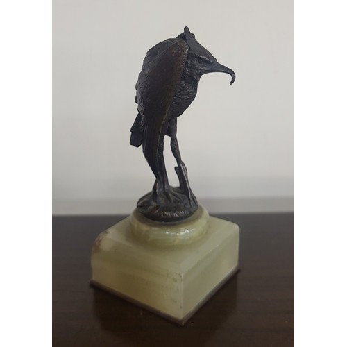 358 - A small French bronze figure of a vulture, on an green onyx socle