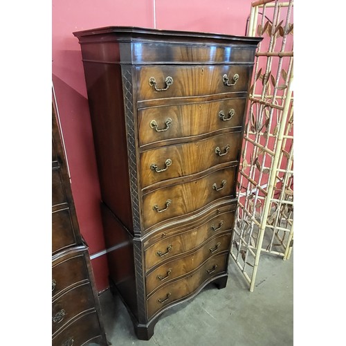 116 - A George III style mahogany serpentine chest on chest