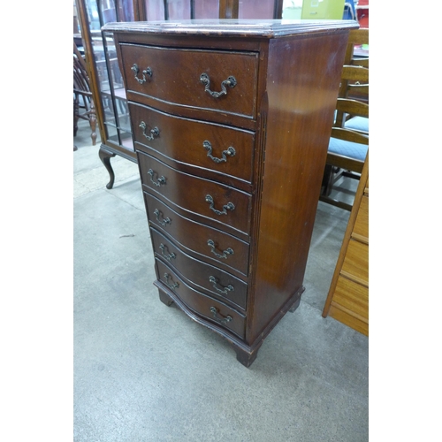 112 - A mahogany serpentine chest of drawers