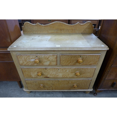 114 - A Victorian scumbled pine chest of drawers