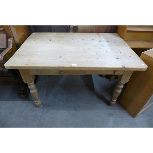 131 - A Victorian style pine single drawer kitchen table