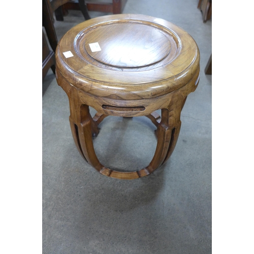 134 - A Chinese hardwood drum shaped stool