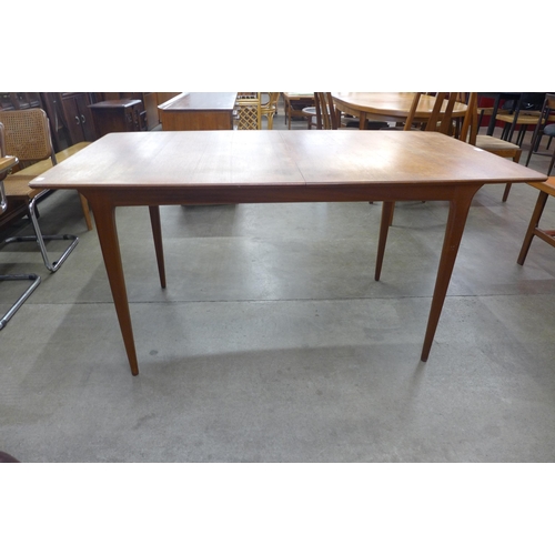 14 - A McIntosh teak T2 model extending dining table