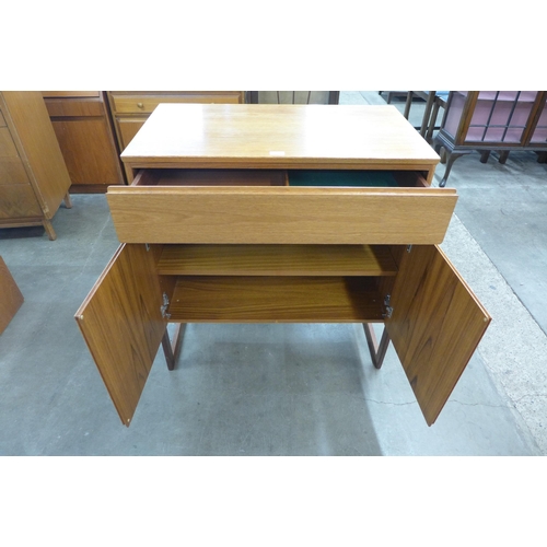 22 - A Danish two door teak cabinet