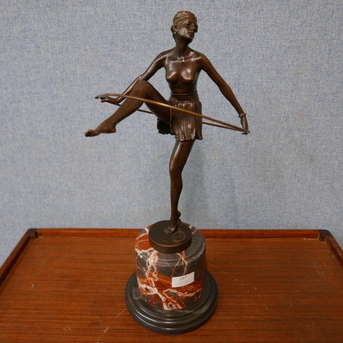 297 - An Art Deco style bronze figure of a female dancer, on rouge marble socle