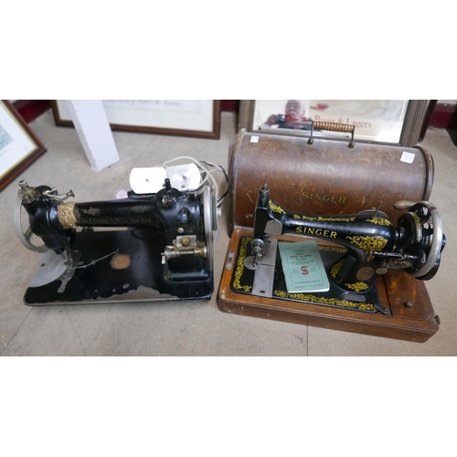 302 - A cased Singer sewing machine and one other