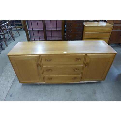 31 - An Ercol Blonde elm Windsor sideboard