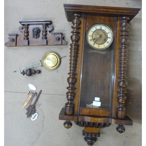 314 - A 19th Century walnut Vienna wall clock