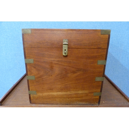 317 - A campaign style teak and brass mounted wine box