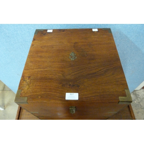 317 - A campaign style teak and brass mounted wine box