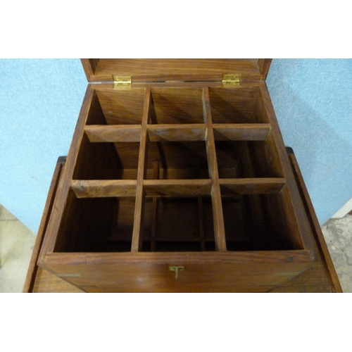 317 - A campaign style teak and brass mounted wine box