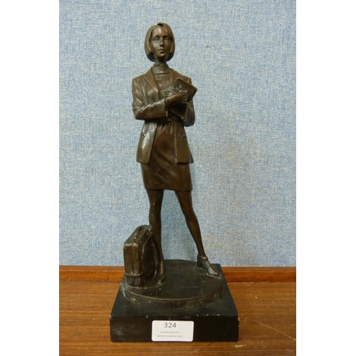 324 - A bronze figure of a female librarian