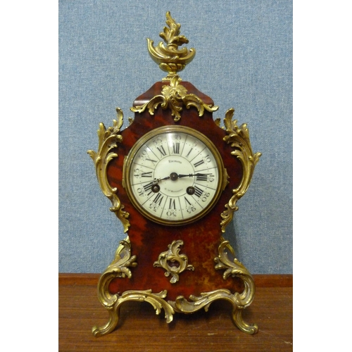 340 - An early 20th Century French faux tortoiseshell and gilt metal mounted mantel clock