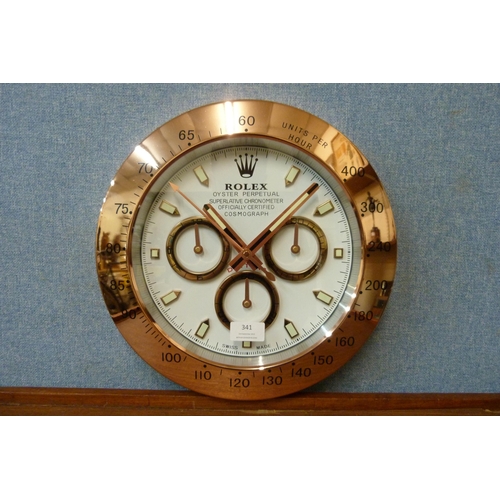 341 - A Rolex style dealer's display wall clock