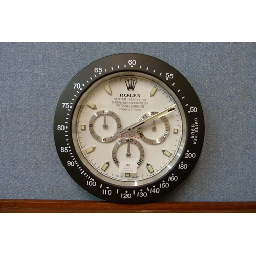 342 - A Rolex style dealer's display wall clock