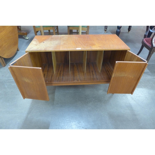 38 - A teak record cabinet