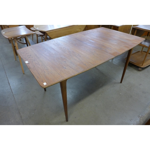 61 - A McIntosh teak T2 model extending table and four chairs