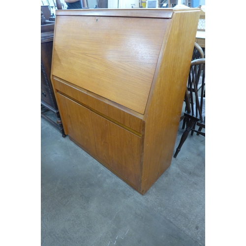 79 - A Remploy teak bureau