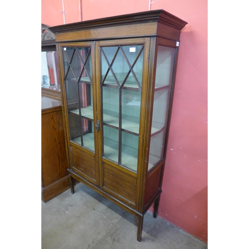 98 - An Edward VII inlaid mahogany two door side cabinet