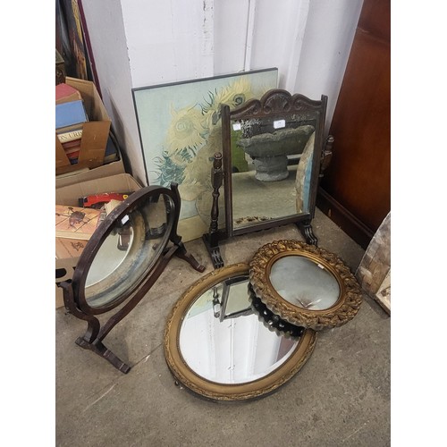 346 - Two gilt framed mirrors, two mahogany toilet mirrors and a Van Gogh print