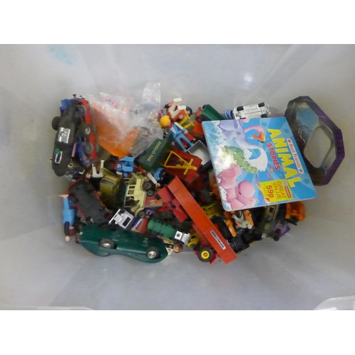 2083 - A box of toys inc. deluxe marbles, hot rod racer Lego, and toy cars