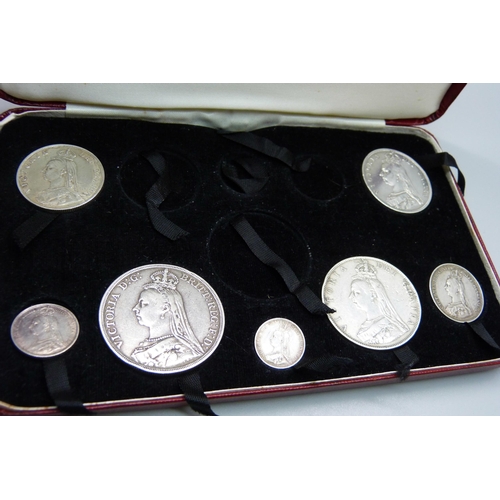 1013 - Seven 1887 Victoria Jubilee year silver coins, in a case