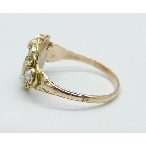 1023 - A yellow metal and seed pearl ring, 2.6g, Q