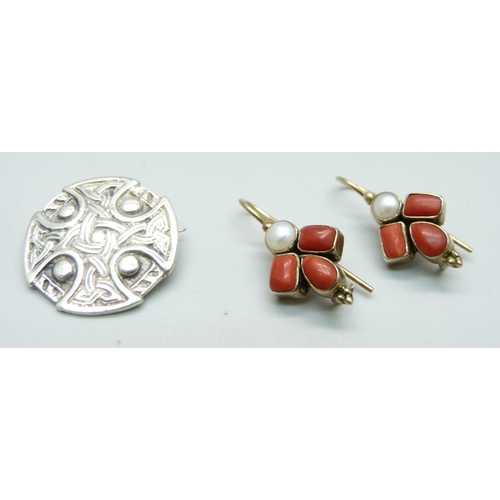 1030 - Two silver brooches, a silver ring and four pairs of earrings