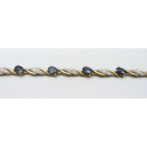 1033 - A 9ct gold sapphire and diamond bracelet, 7.5g, 19cm