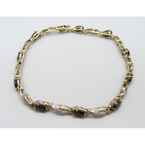 1033 - A 9ct gold sapphire and diamond bracelet, 7.5g, 19cm