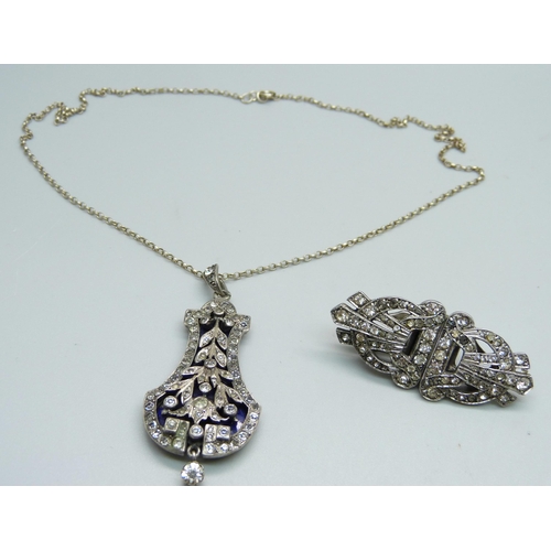 1041 - A silver paste and enamel pendant and chain, and a silver paste double clip brooch