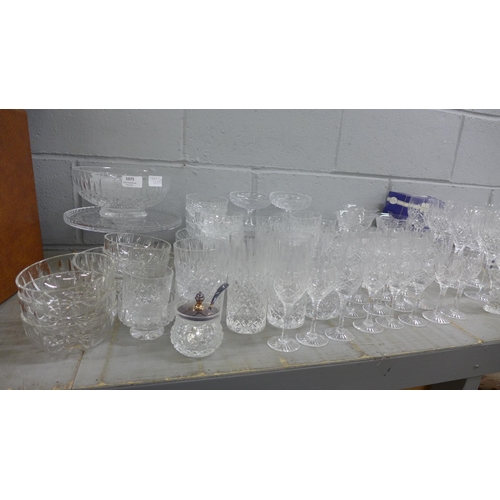 1075 - A suite of Stuart crystal and other crystal, including sets of eight champagne flutes, tall wines, m... 