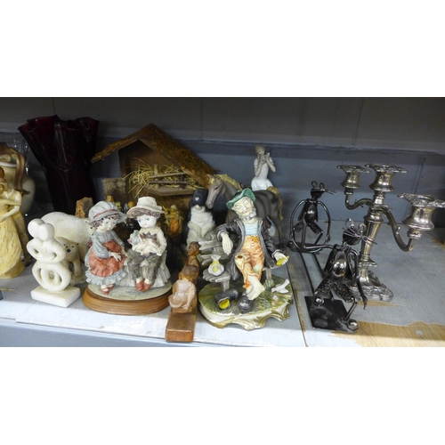 1079 - A collection of figures and a plated candelabra, etc. **PLEASE NOTE THIS LOT IS NOT ELIGIBLE FOR POS... 