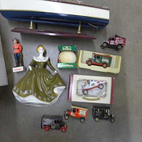 1093 - A collection of model cottages, cars and a Royal Doulton figure, Geraldine **PLEASE NOTE THIS LOT IS... 