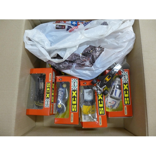 1105 - A case of Scalextric track and a box of Matchbox Scalextric cars, (four boxed) **PLEASE NOTE THIS LO... 
