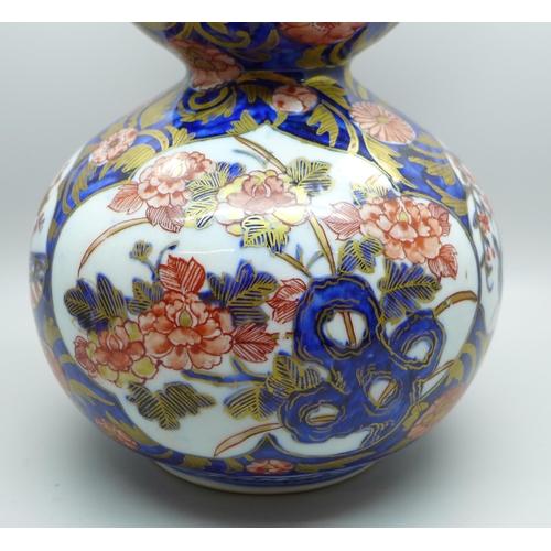 607 - A Japanese porcelain double gourd vase, 28cm