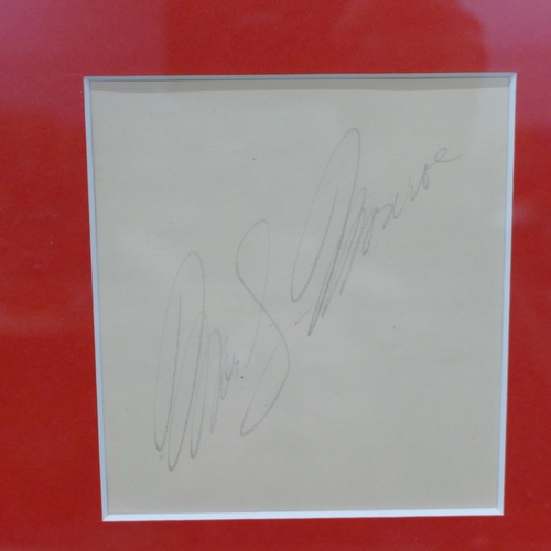 611 - A Marilyn Monroe autographed display, signed in pencil