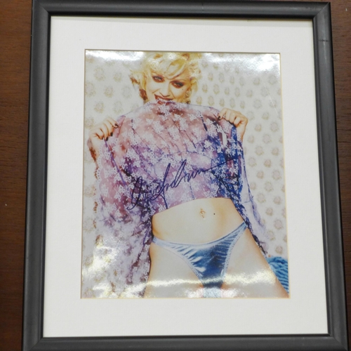 613 - A Madonna signed photograph display