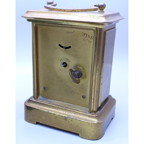 621 - A carriage clock with travel case