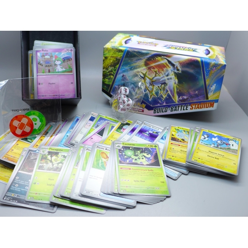 631 - 300 Pokemon cards from Scarlet and Violet set with dice, coins and collectors box