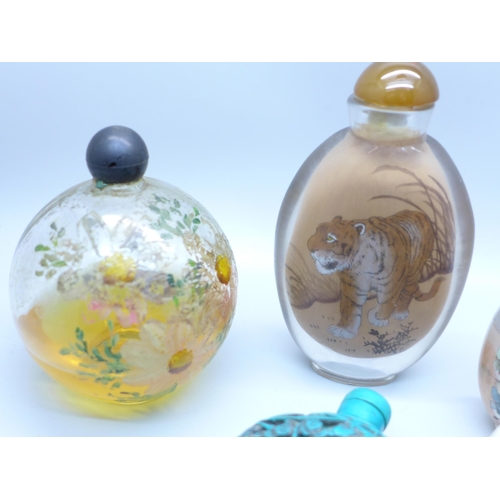 640 - A collection of nine scent bottles