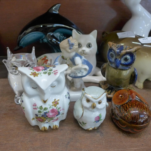 654 - A collection of animal and owl figures including a clear glass owl paperweight signed G. Ruocco, pig... 