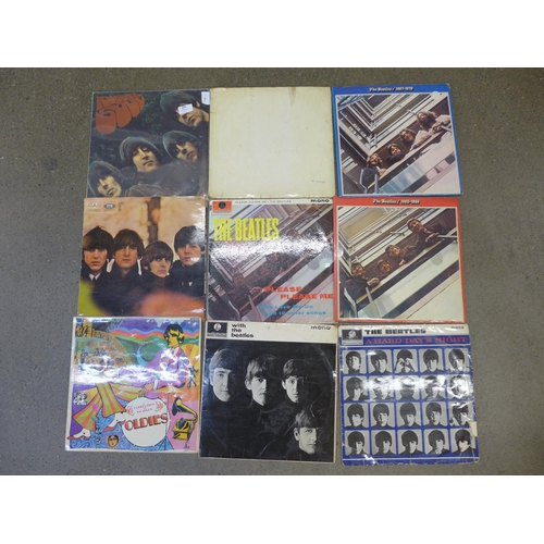 664 - A collection of eight The Beatles LP records including The White Album, (numbered), a/f
